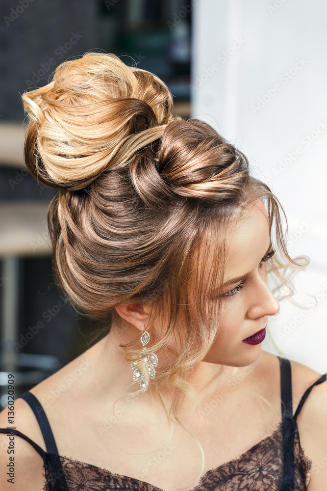 Elegant evening hairstyle for the beautiful woman