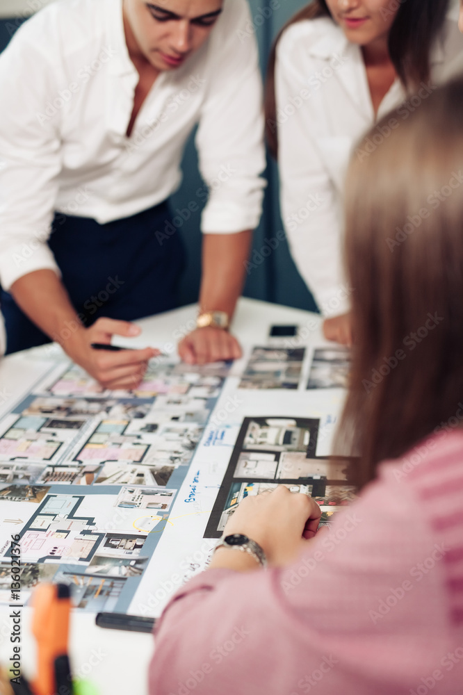 Close up hands of professional architects discussing the project Close up hands of professional architects discussing the project