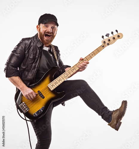 Canvas Print Bassist plays bass guitar.