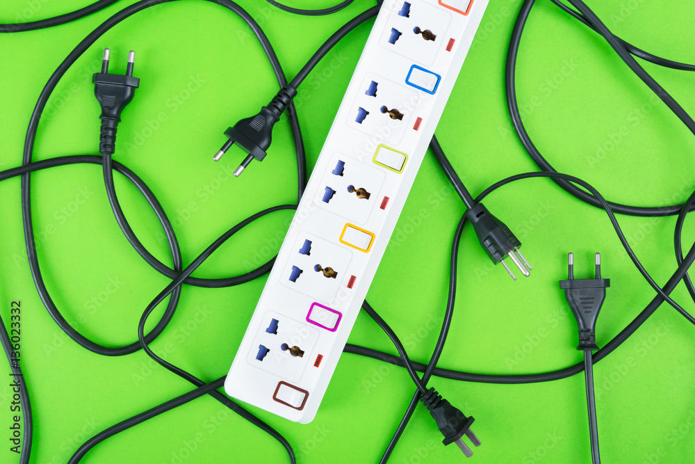 Messy of electrical cords plugs and wires unconnected electrical power