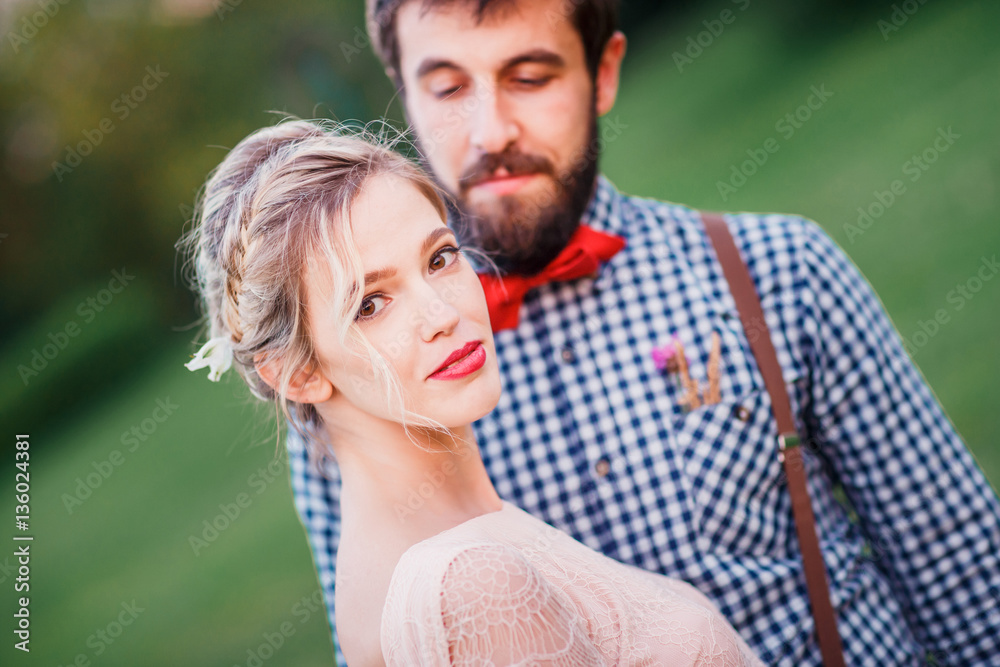 Beautiful bride and bearded groom.
