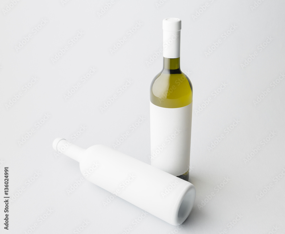 Two wine bottle are standing on gray background Two wine bottle are standing on gray background