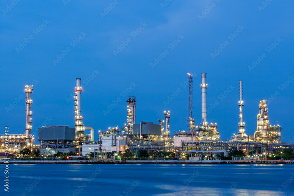 Oil refinery plant of Petrochemistry industry in twilight time,