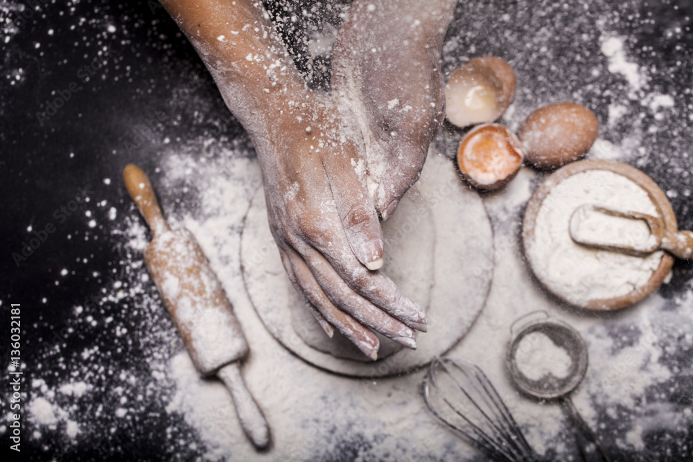Fototapeta premium Baker prepares bread.