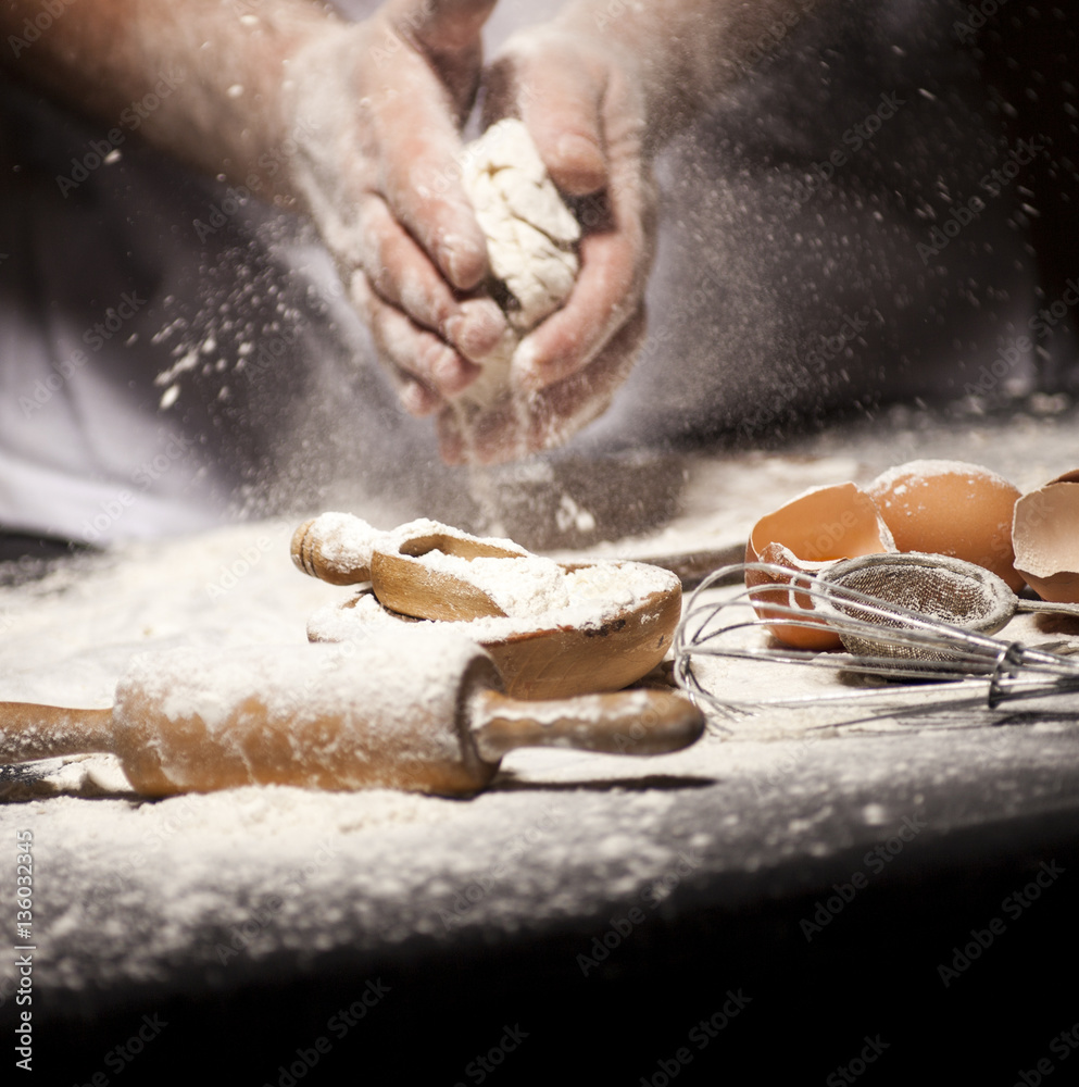 Baker prepares bread.