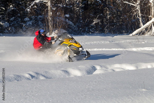 Athlete on a snowmobile