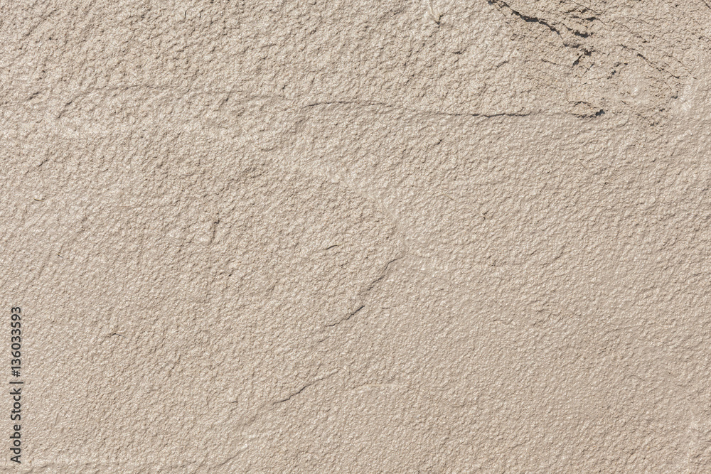 The new and wet stucco cement exterior wall background under con The new and wet stucco cement exterior wall background under con