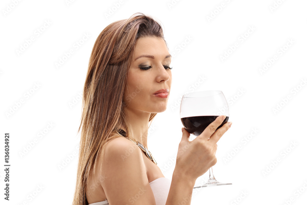 Young woman holding a glass of wine Young woman holding a glass of wine