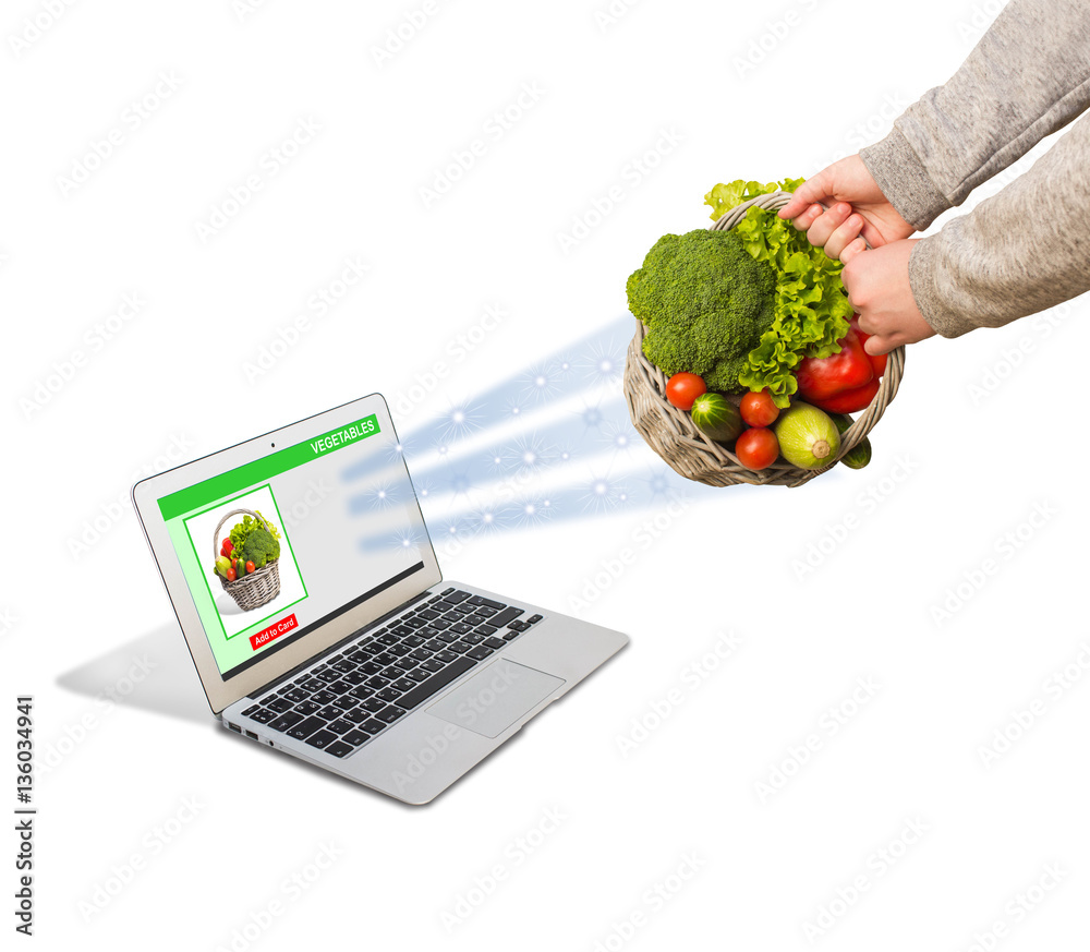 Online shopping concept. The basket of vegetables purchased via the Internet.