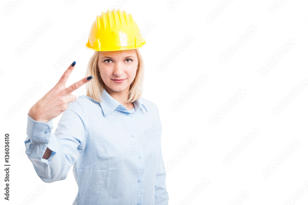 Woman architect showing number two gesture Woman architect showing number two gesture