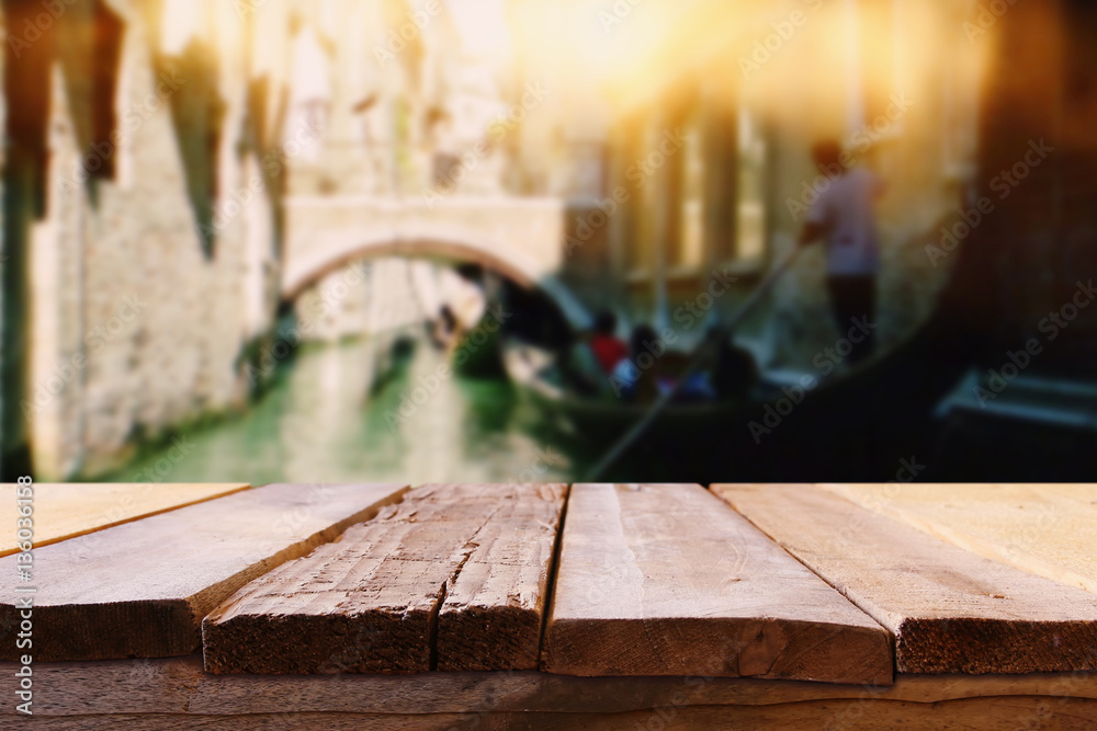 Empty table in front of blurry romantic venice background Empty table in front of blurry romantic venice background
