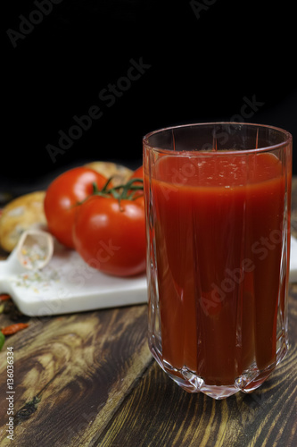 Raw Organic red Tomato Juice with salt  basil and bread