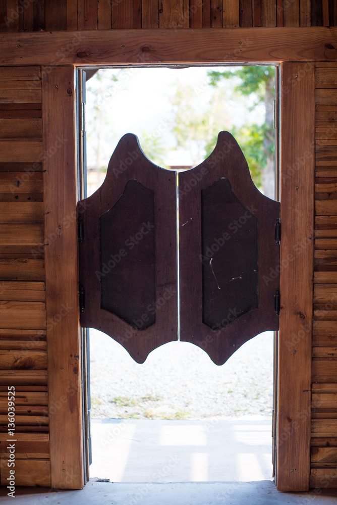 Swing doors with cowboy style. foto de Stock | Adobe Stock