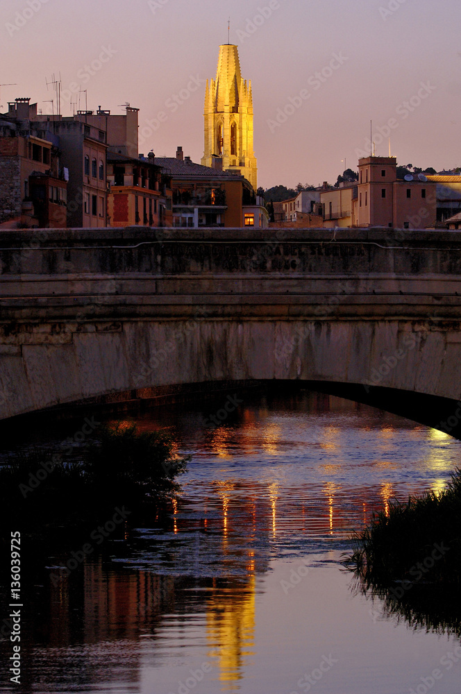 night view of the Sant Feliu Church and Onyar River in Girona, Catalonia,Spain