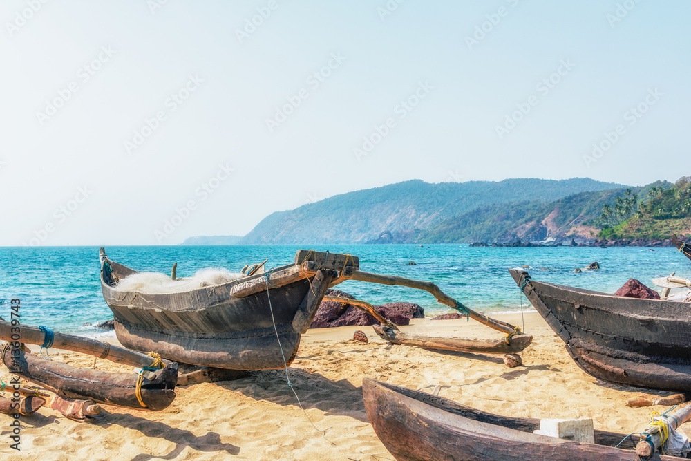 Fototapeta premium Ocean Beach in summer sunlight. Goa, India. Vivid, splittoned image.