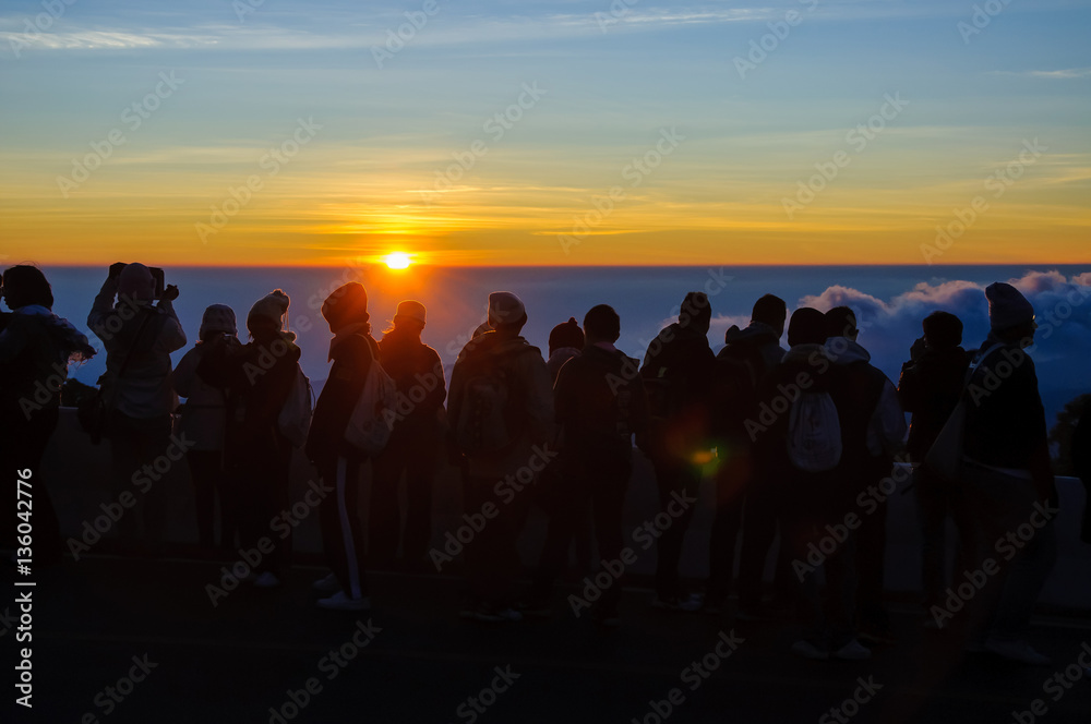 Sunrise at the skyline and silhouette people Sunrise at the skyline and silhouette people