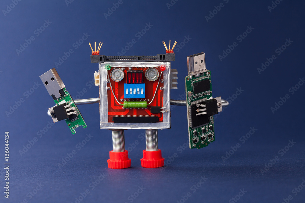 Backup information concept. Robot with portable devices usb flash stick.  Macro, blue background foto de Stock | Adobe Stock