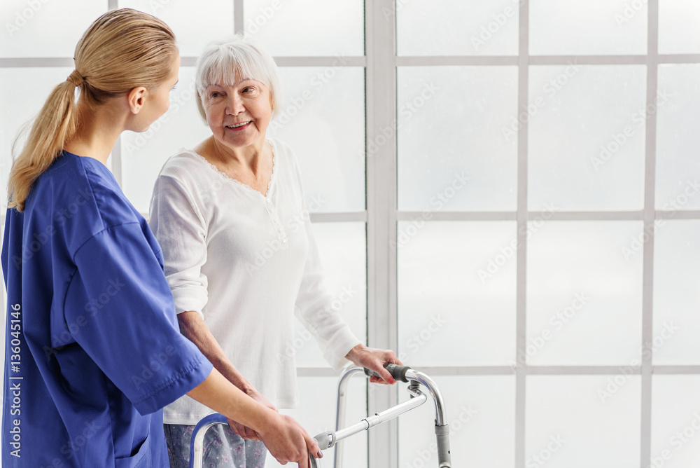 Doctor availing retiree going with gutter frame Doctor availing retiree going with gutter frame