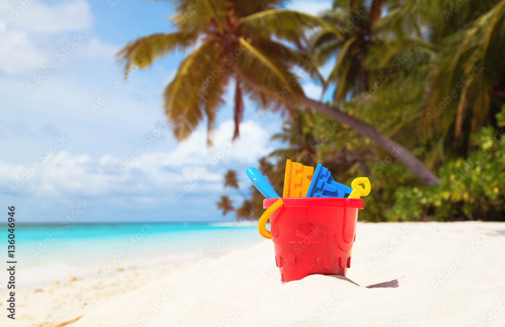 kid toys on tropical sand beach kid toys on tropical sand beach