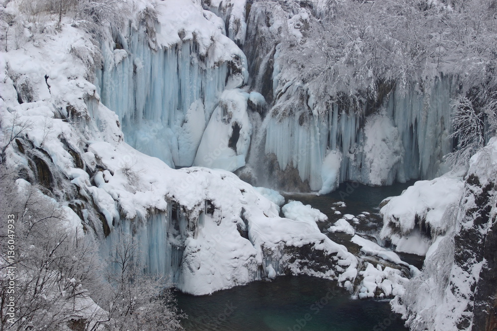 Plitvice lakes, World famous National park in Croatia, UNESCO world heritage, frozen waterfalls, cold winter scene Plitvice lakes, World famous National park in Croatia, UNESCO world heritage, frozen waterfalls, cold winter scene