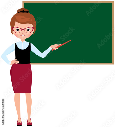 Woman teacher in full length standing at the school blackboard a