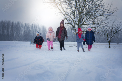 Group of children in the snow.