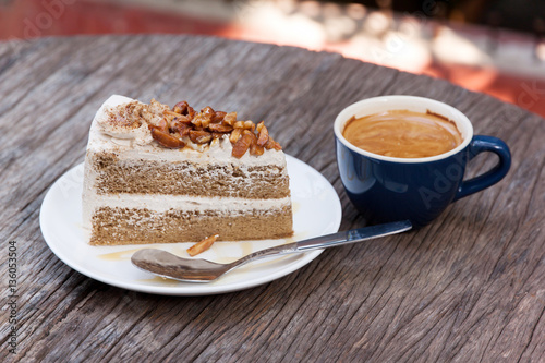 Coffee cake with almond and hot espresso