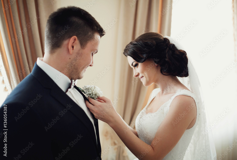 beautiful bride pinch back boutoniere on jacket of groom beautiful bride pinch back boutoniere on jacket of groom