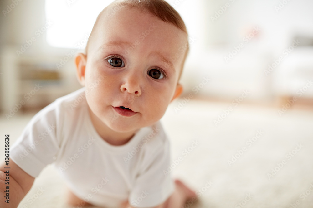 close up of happy little baby boy or girl at home