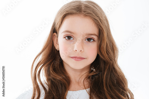 Closeup of pretty cute little girl with long hair