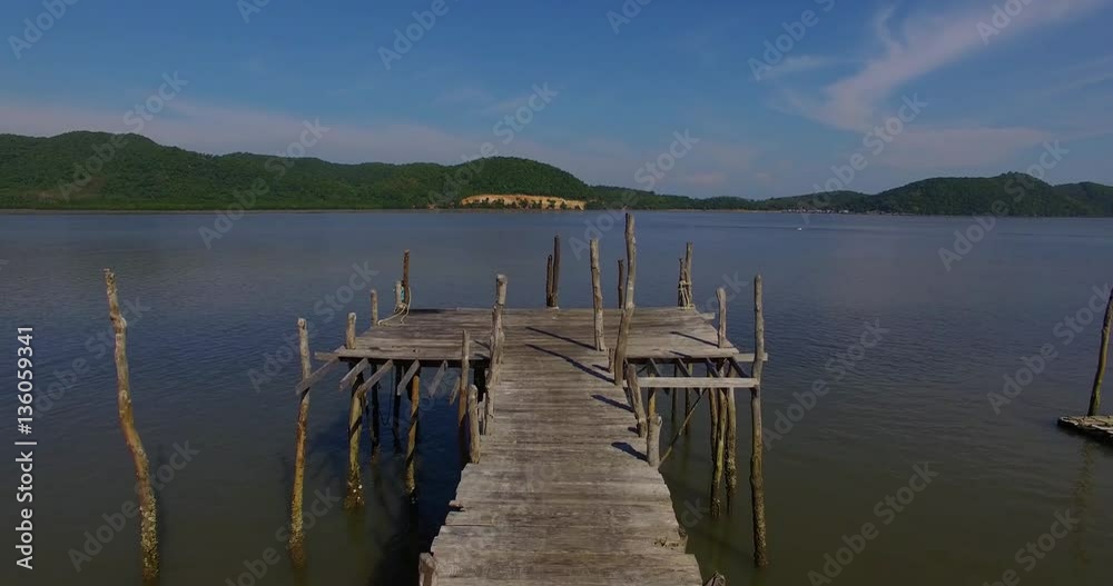 Aerial: Old wooden pier. Aerial: Old wooden pier.