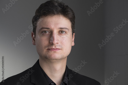 Portrait of a man looking at the camera, blank look