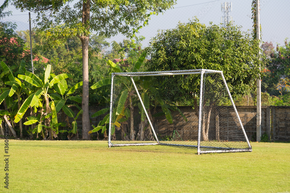 empty soccer or football goal in a school soccer field empty soccer or football goal in a school soccer field