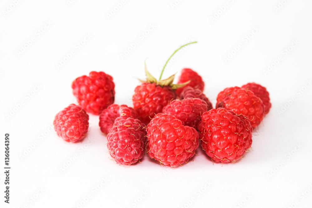Heap of red ripe raspberry isolated on white Heap of red ripe raspberry isolated on white