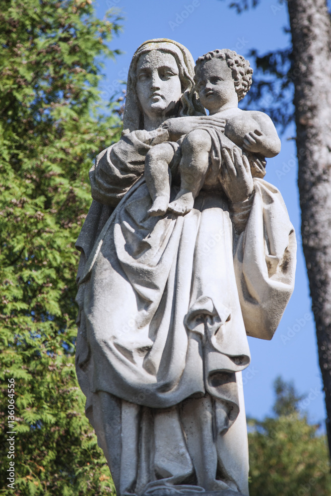 antique statue of the Virgin Mary with the baby Jesus Christ