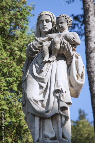 antique statue of the Virgin Mary with the baby Jesus Christ