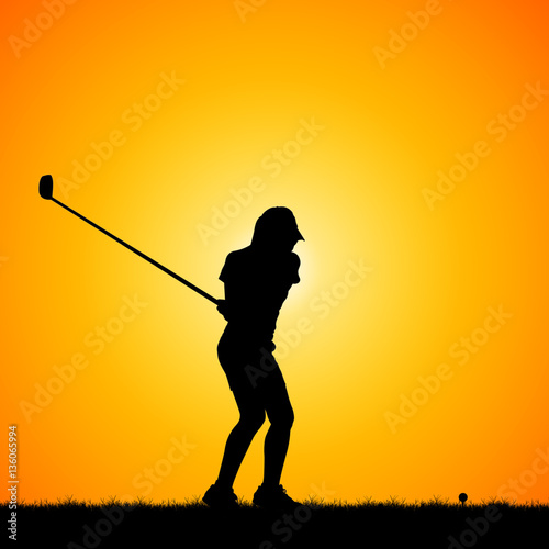 silhouettes golfers against sunset background