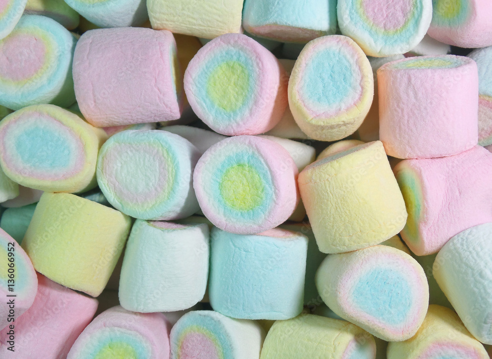 Heap of Closed up Pastel Pink, Yellow, Blue Colored Marshmallows for Background, Banner, Texture Heap of Closed up Pastel Pink, Yellow, Blue Colored Marshmallows for Background, Banner, Texture