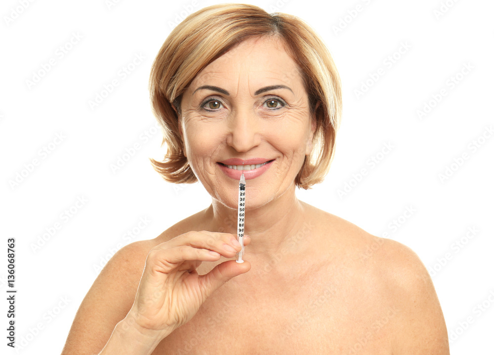 Senior woman with hyaluronic acid injection on white background Senior woman with hyaluronic acid injection on white background