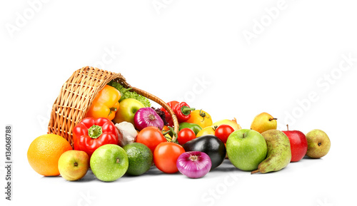 Fresh vegetables and fruits with basket  on white background