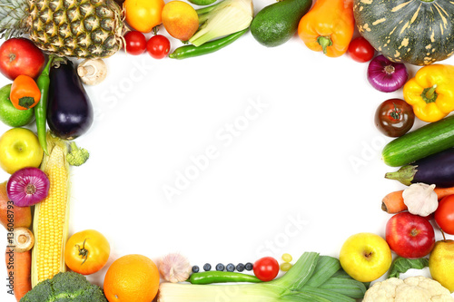 Fresh vegetables and fruits on white background