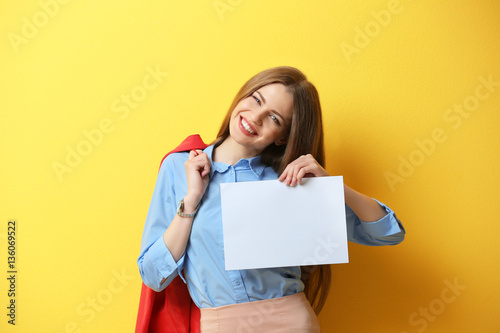 Young woman posing with pap...
