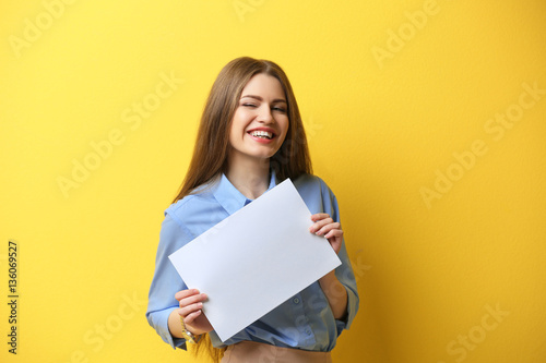 Young woman posing with pap...