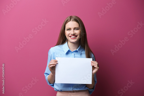 Young woman posing with pap...