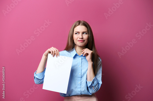 Young woman posing with pap...