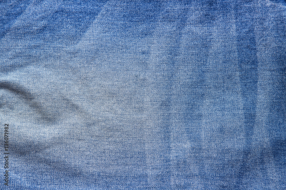 Naklejka premium Denim jeans fabric texture background 