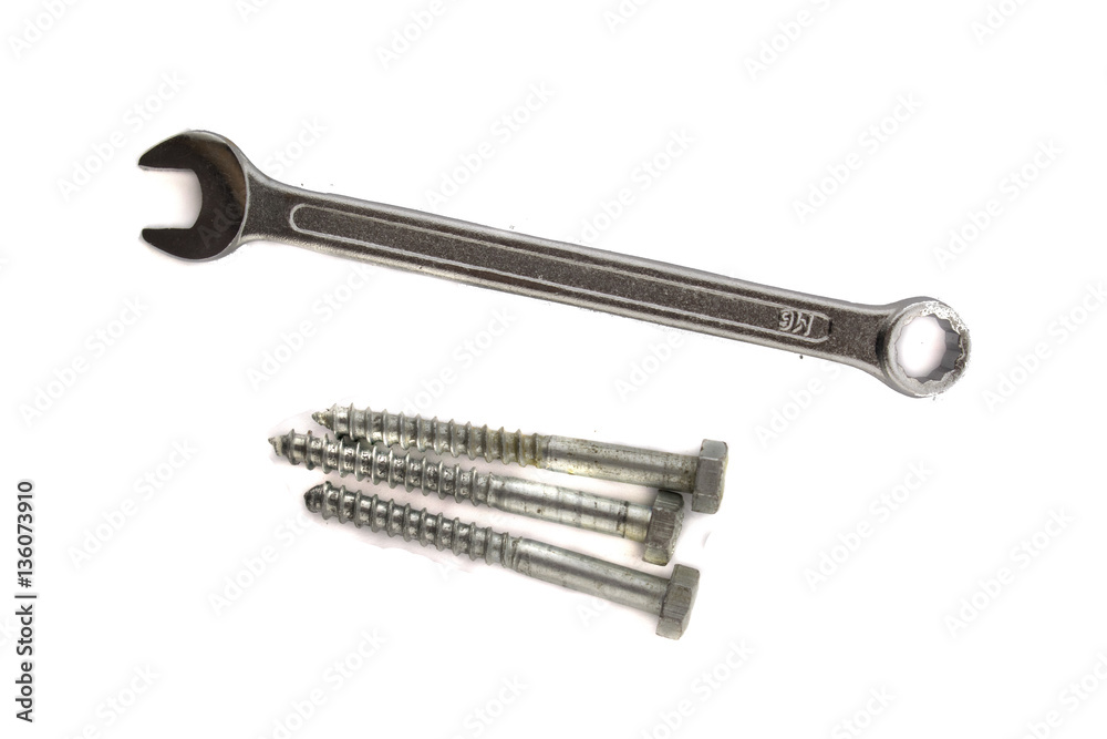 Hex wrench and screws on the white background Hex wrench and screws on the white background