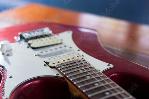 Electric guitar on wooden table