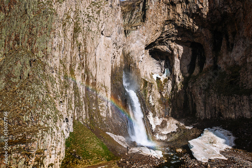 Huge beautiful waterfall in Caucasus mountains