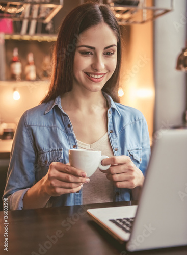 Beautiful girl at the cafe